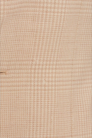 Close-up of beige woven fabric texture