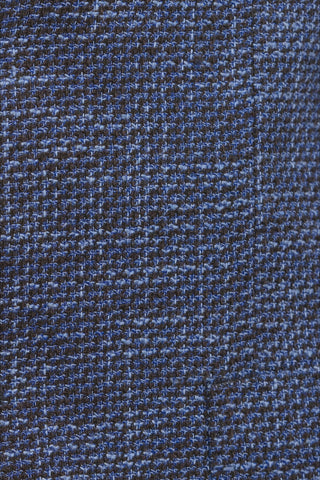 Close-up of blue fabric with a textured pattern