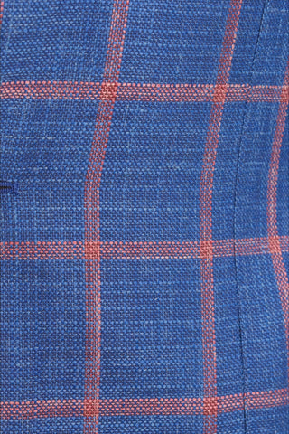 Close-up of blue fabric with orange plaid pattern