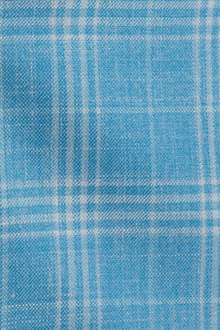 Close-up of blue fabric with a plaid pattern