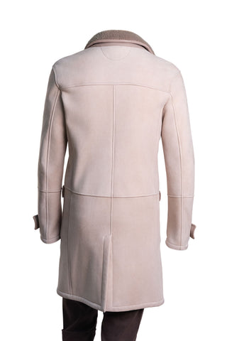 Beige coat on a white background