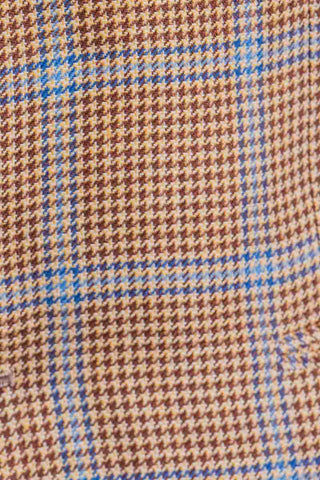 Close-up of a brown and blue plaid fabric pattern