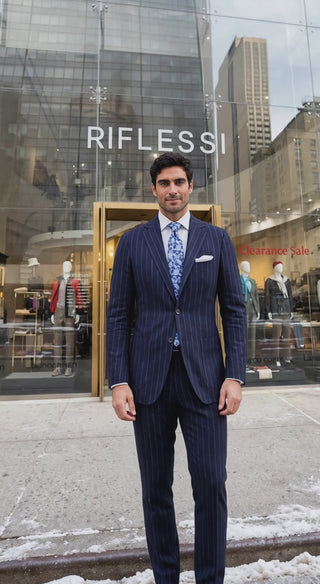 Sartorio Pinstripe Virgin-Wool Suit — model exits store, turns, returns (approved by Avi)