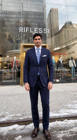 Sartorio Pinstripe Virgin-Wool Suit — model outside Riflessi storefront (approved by Avi)